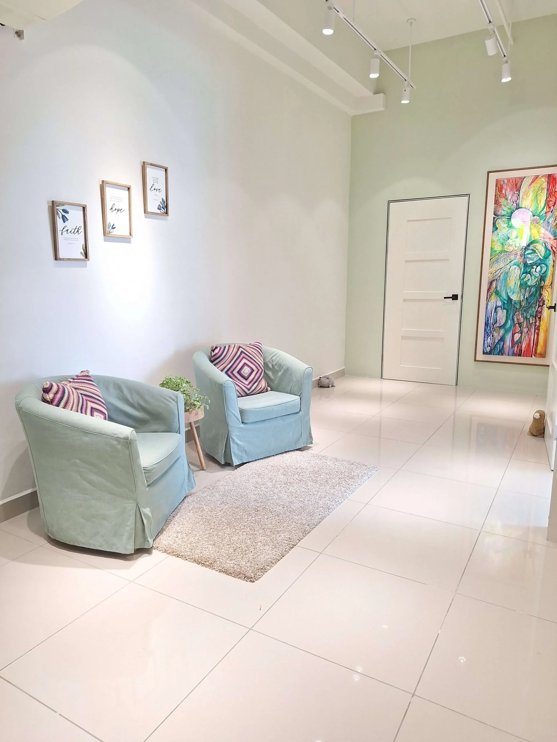 Client Waiting Lounge Counselling room lounge area with chairs and calming décor